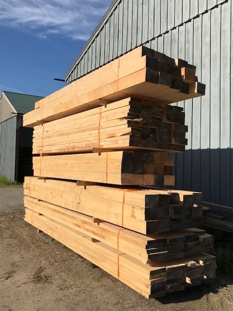 sawn planks and timbers https://storerlumber.com/wp-content/uploads/2022/02/sawn-planks-and-timbers.jpeg
